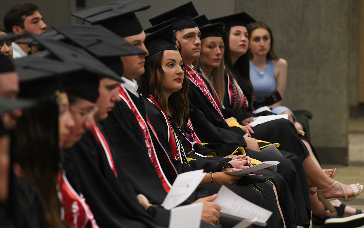 Student-athletes are waiting to receive their diplomas as part of the Athletics Diploma Ceremony.