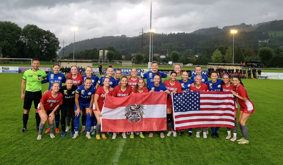 The Catholic University Women's Soccer Team in Austria after playing a game.