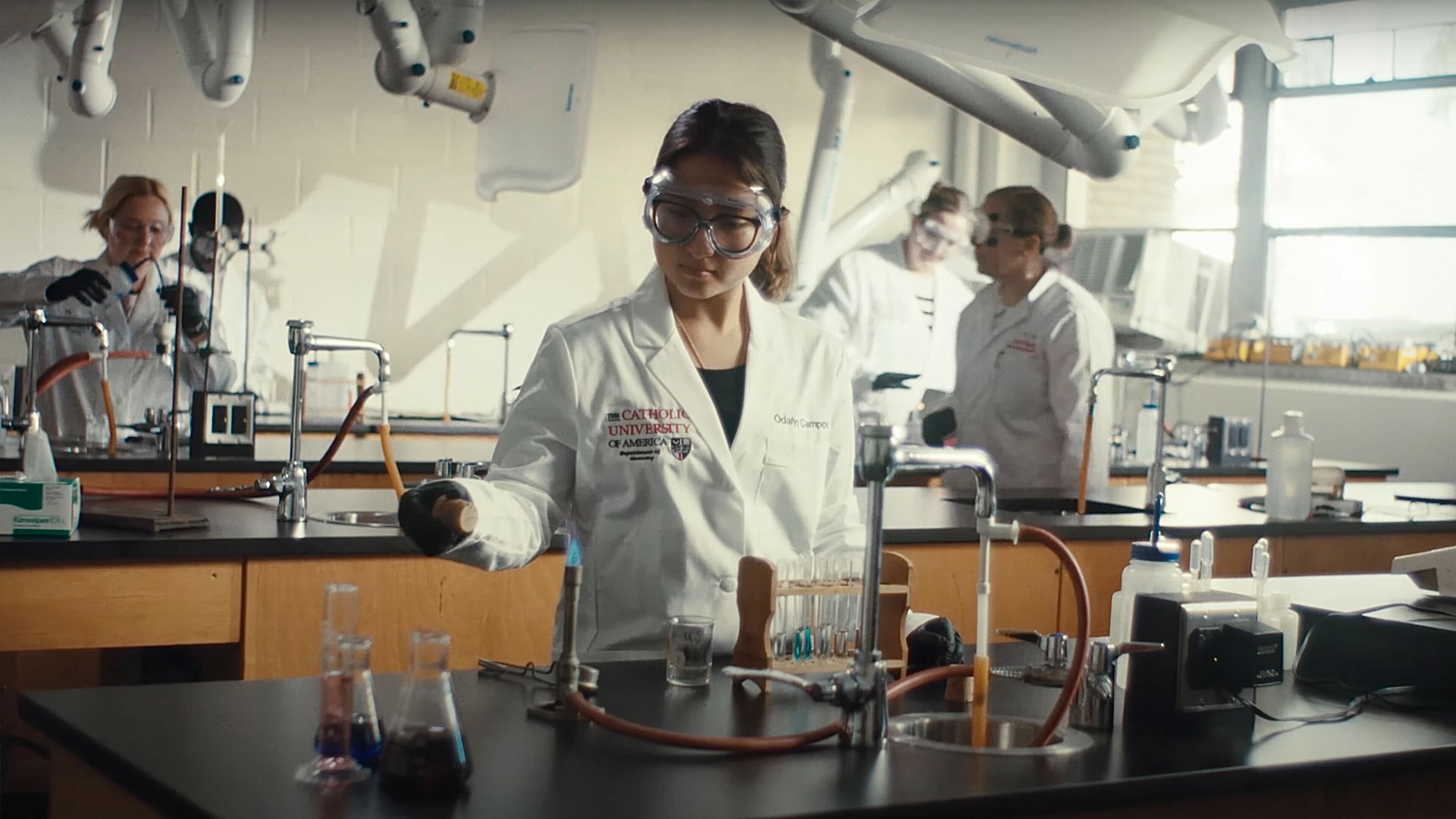 CUA students working in a lab.