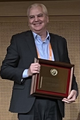 Professor David Jobes receiving an award