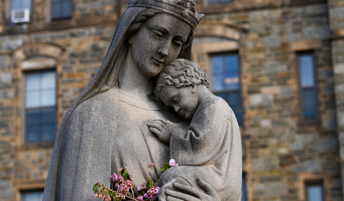 A statue of Madonna and Child in the spring.