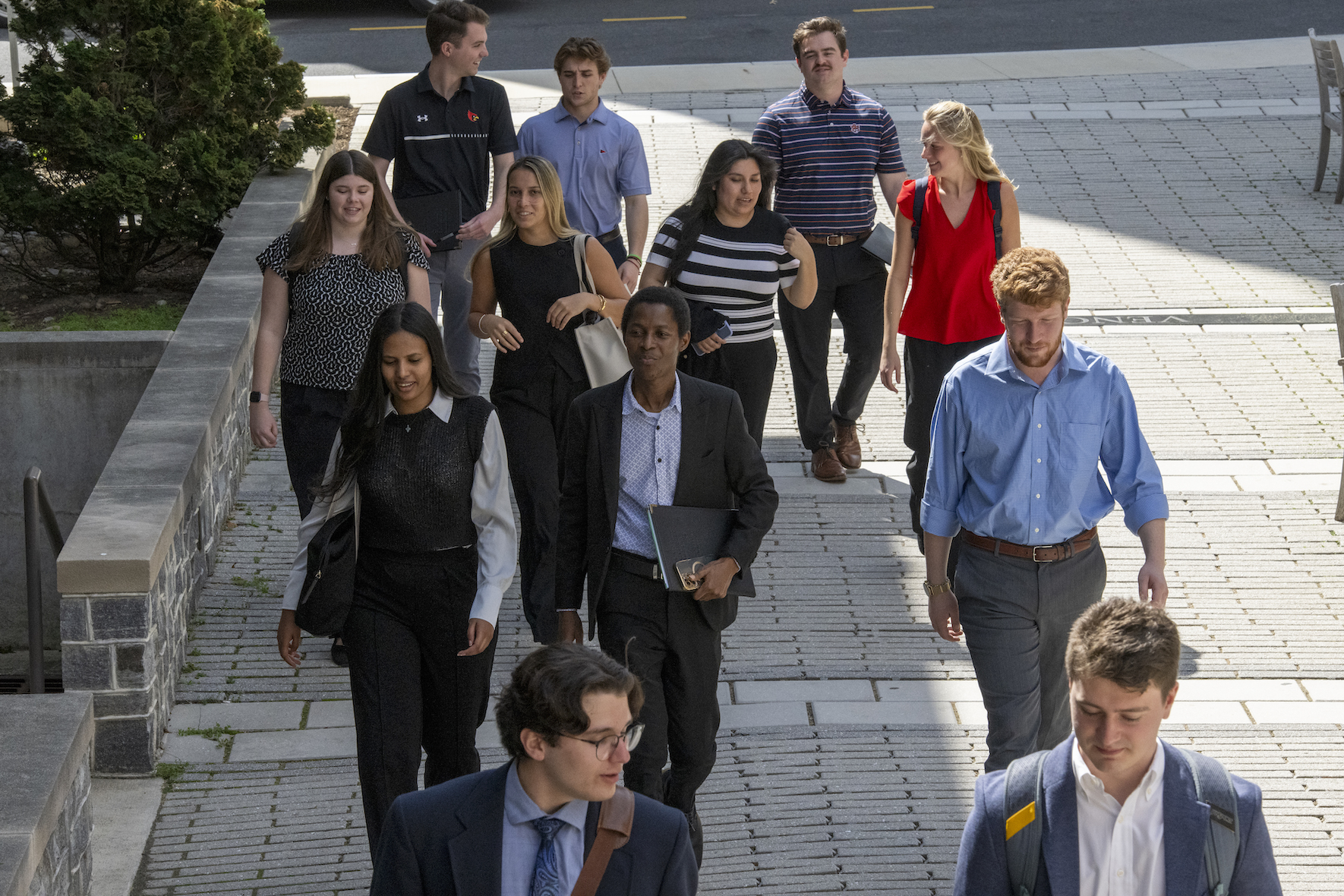 students walking in business casual attire