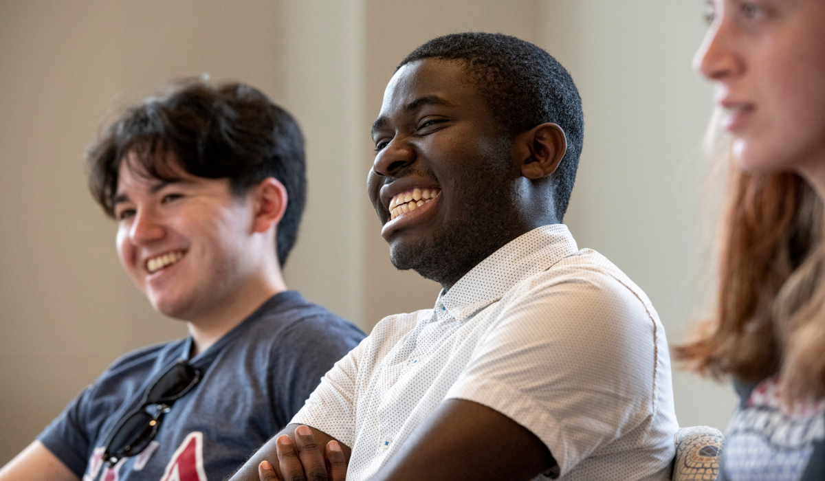 Goodness Odagbodo is grinning during class.