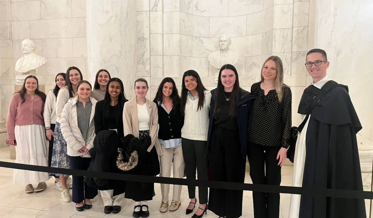 A group of students and a religious brother at the US Supreme Court.