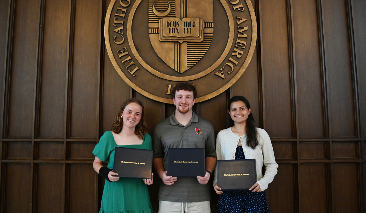 The winners of University Research Day 2026 in Heritage Hall, holding their certificates.