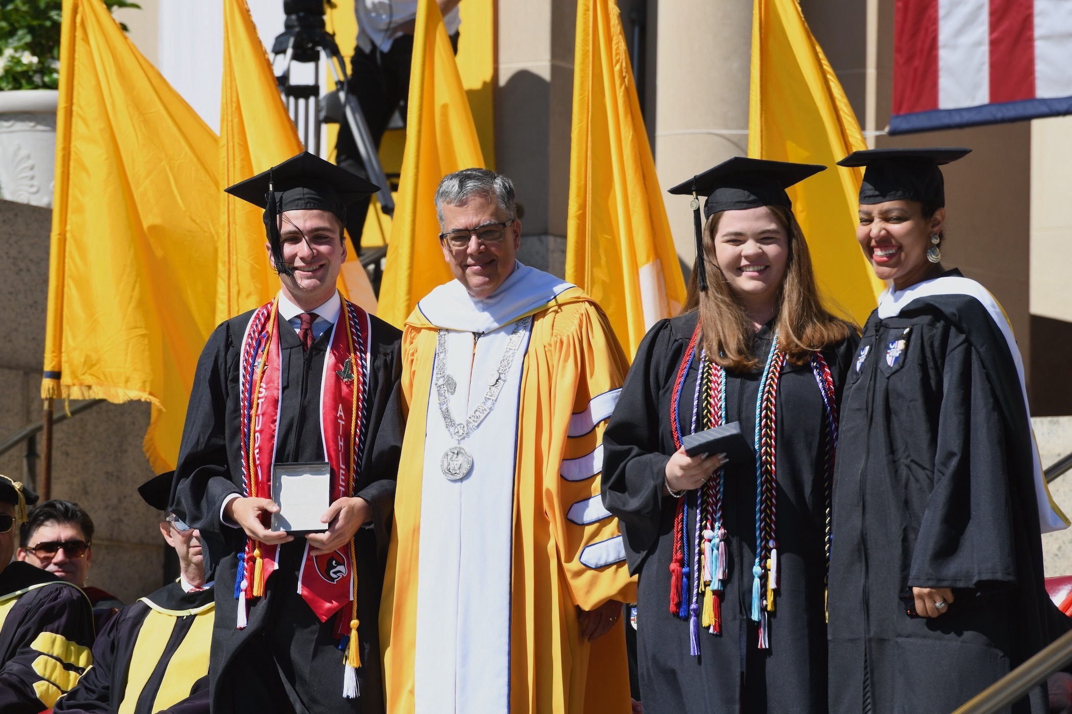 Catholic University graduates, May 16, 2026, with President Kilpatrick
