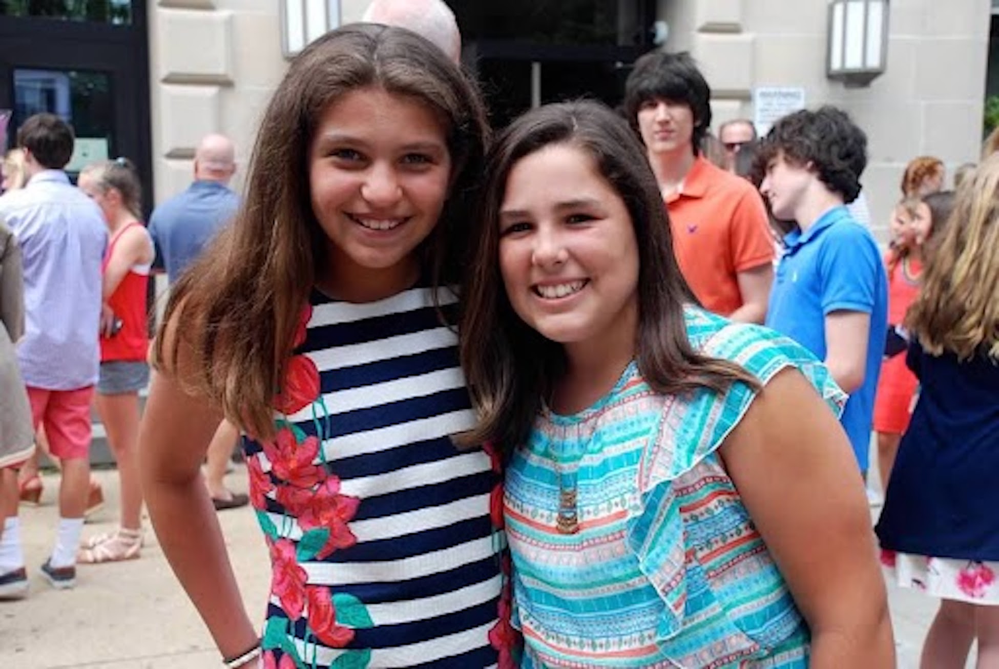 Two friends smile for photo