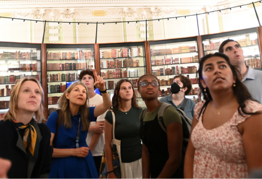 Students with teacher at Library of Congress rare books