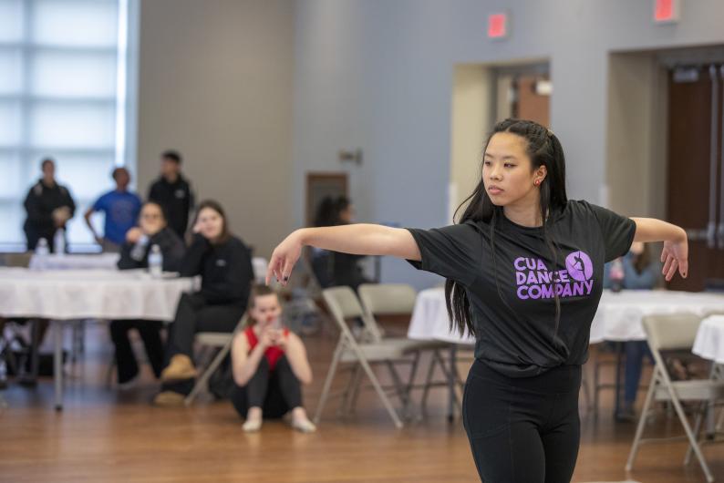 student dancing with the cua dance company