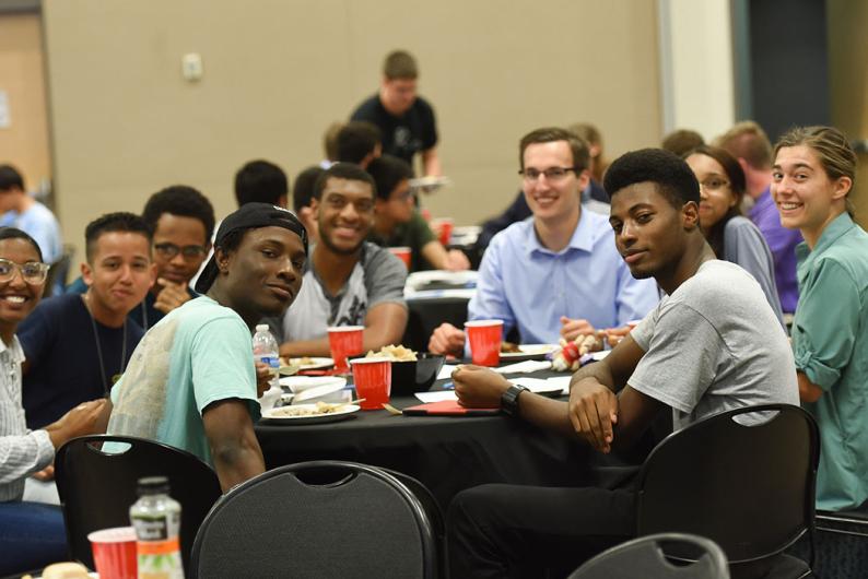 students share a meal together