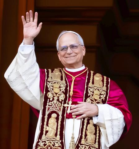Pope Leo XIV waves from the balcony of St. Peter's
