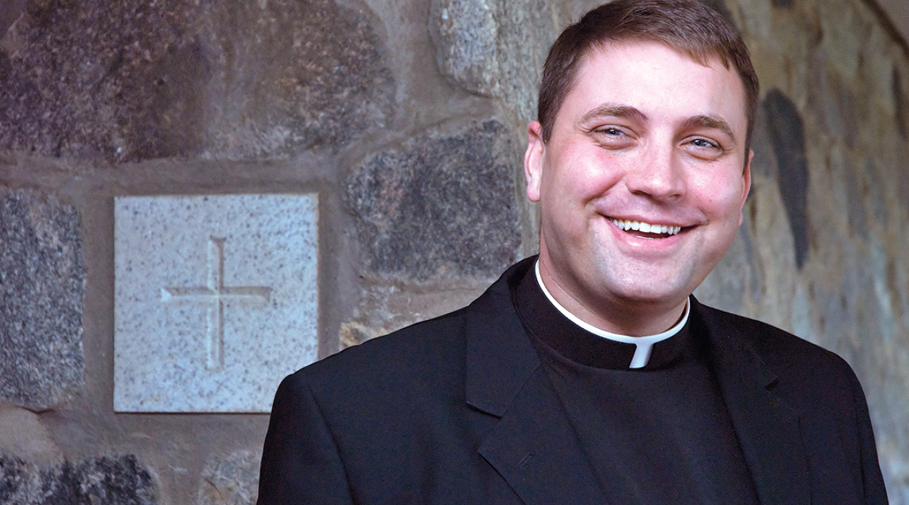Monsignor James Shea smiling