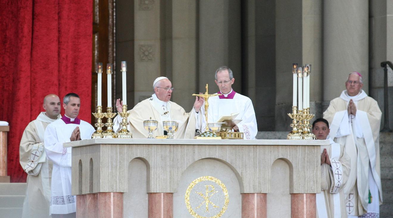 Pope Francis celebrates mass on the steps of the basilica