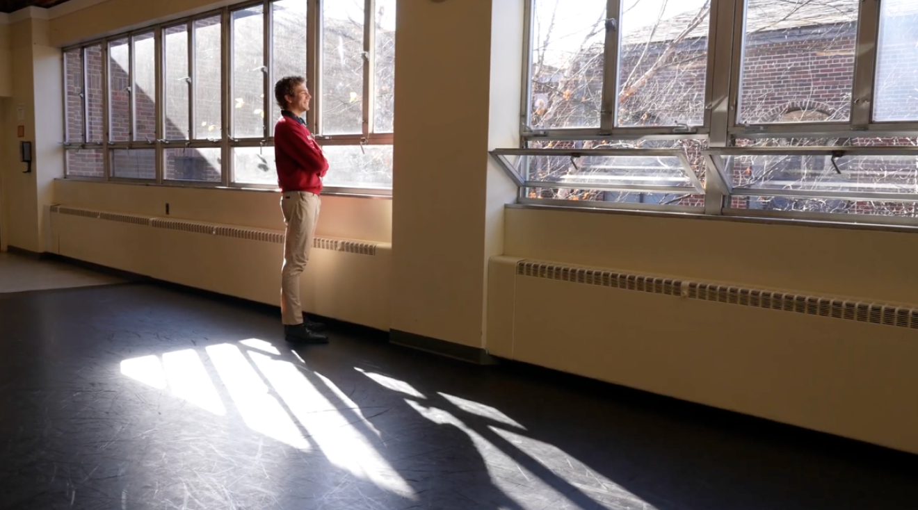 Anthony Graf is staring out a window on campus at Catholic University.